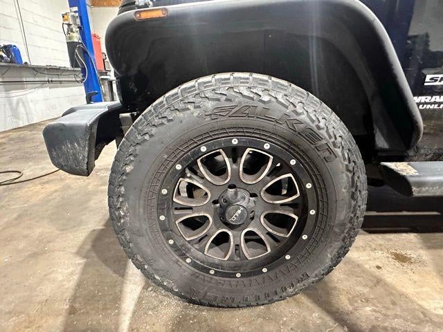 2013 Jeep Wrangler Unlimited 4WD 4dr Freedom Edition *Ltd Avail*